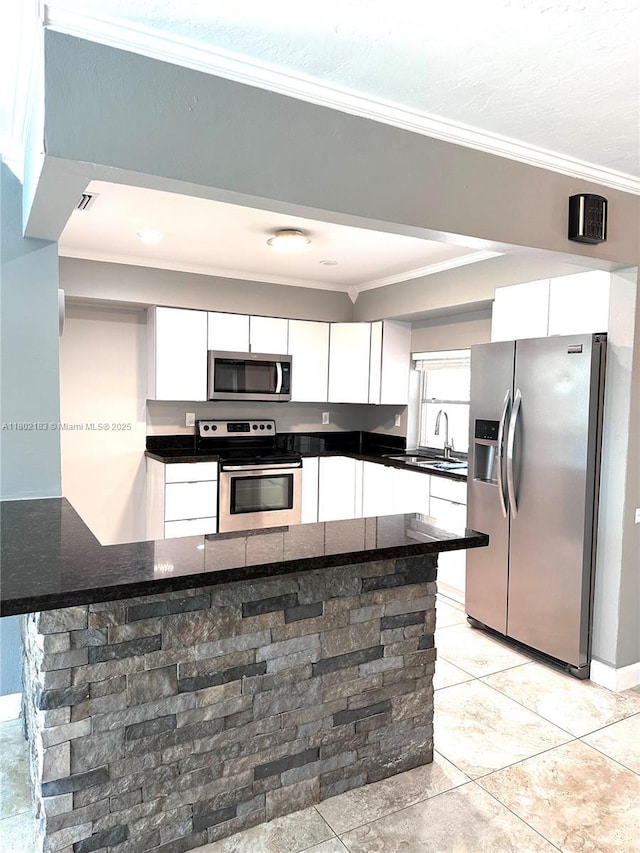 8761 NW 12th St, Pembroke Pines, FL 33024 - kitchen with stainless steel appliances, ornamental molding, white cabinets, a sink, and dark countertops