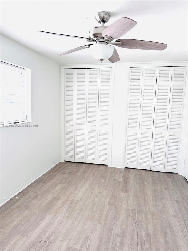 8761 NW 12th St, Pembroke Pines, FL 33024 - unfurnished bedroom with light wood finished floors and ceiling fan