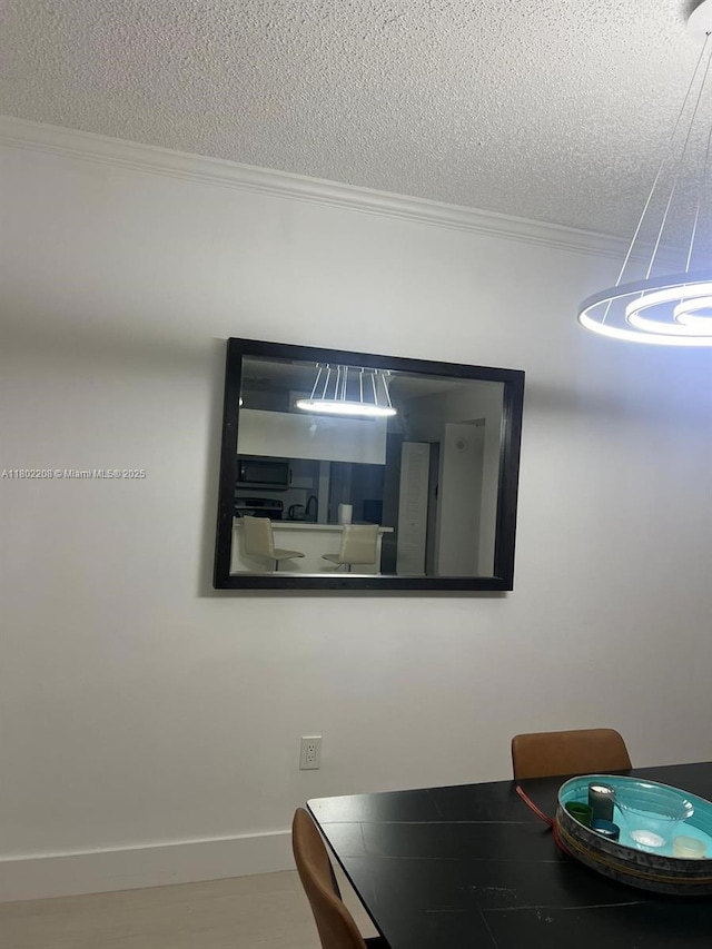 17150 N Bay Rd Unit 2218, Sunny Isles Beach, FL 33160 - detailed view of crown molding and a textured ceiling