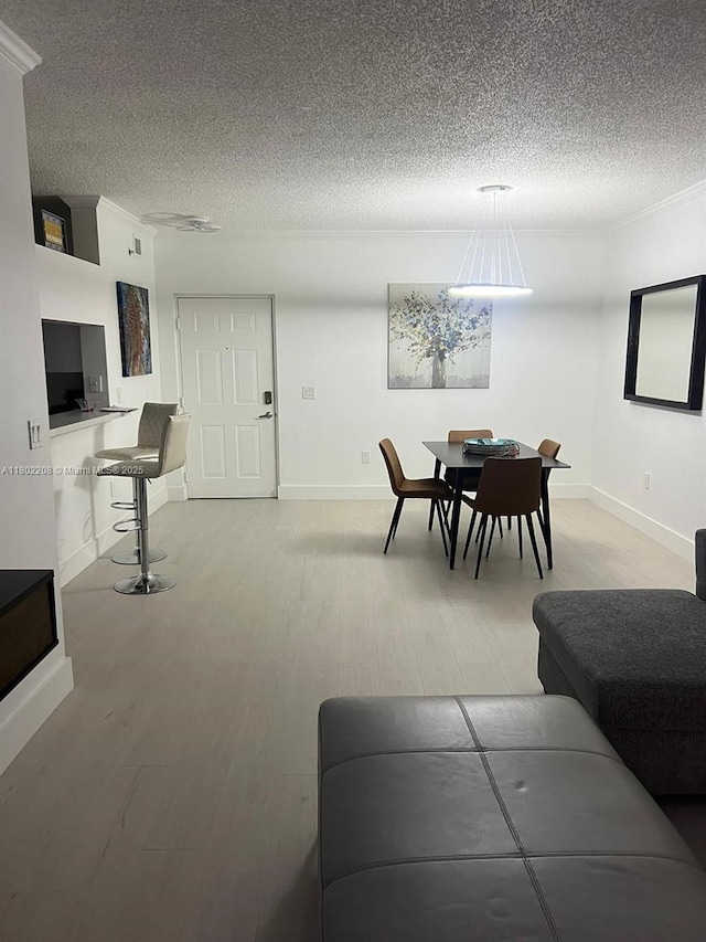 17150 N Bay Rd Unit 2218, Sunny Isles Beach, FL 33160 - living room featuring light wood finished floors and a textured ceiling