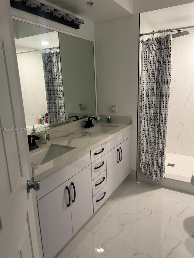 17150 N Bay Rd Unit 2218, Sunny Isles Beach, FL 33160 - bathroom featuring a shower stall, double vanity, and marble look tile flooring