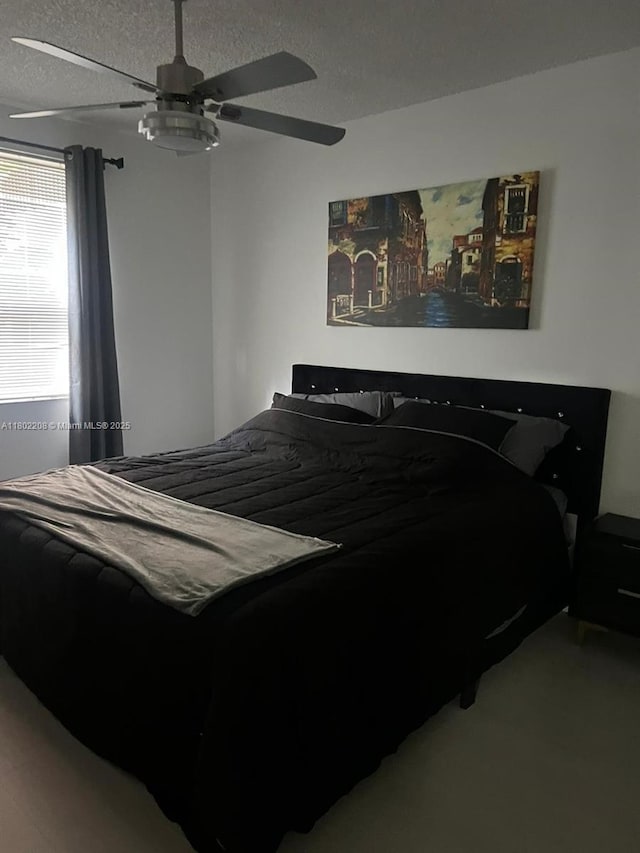 17150 N Bay Rd Unit 2218, Sunny Isles Beach, FL 33160 - bedroom with a ceiling fan and a textured ceiling