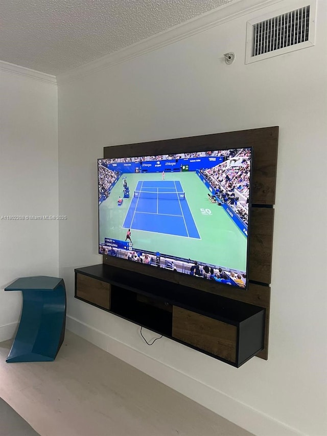 17150 N Bay Rd Unit 2218, Sunny Isles Beach, FL 33160 - detailed view of crown molding and a textured ceiling