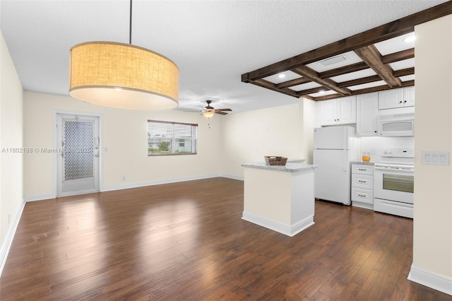 kitchen featuring white appliances, a ceiling fan, beamed ceiling, white cabinets, and dark wood finished floors