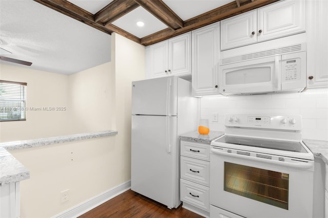 kitchen with white appliances, white cabinets, dark wood-style floors, and decorative backsplash
