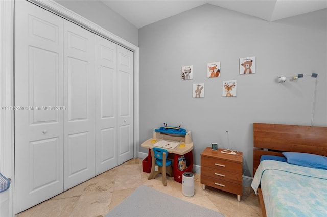 2898 SW 2nd Ave, Miami, FL 33129 - bedroom with a closet, lofted ceiling, and baseboards