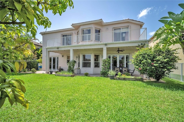 4960 SW 158th Ave, Miramar, FL 33027 - back of property featuring a balcony, stucco siding, a ceiling fan, and french doors