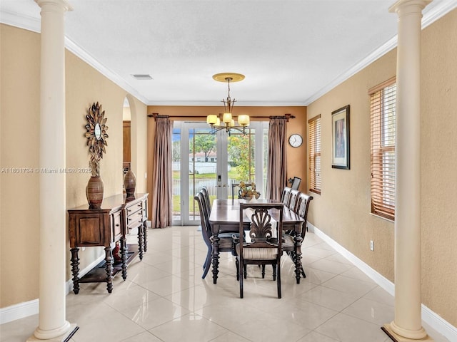 4960 SW 158th Ave, Miramar, FL 33027 - dining space featuring ornamental molding, a textured wall, french doors, arched walkways, and baseboards