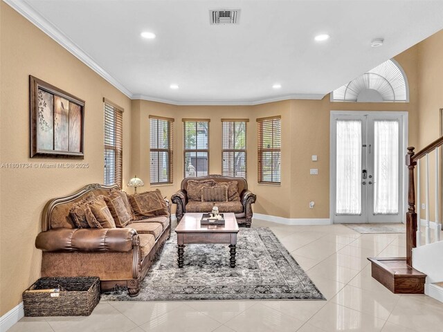 4960 SW 158th Ave, Miramar, FL 33027 - living area featuring ornamental molding, recessed lighting, french doors, light tile patterned flooring, and stairway