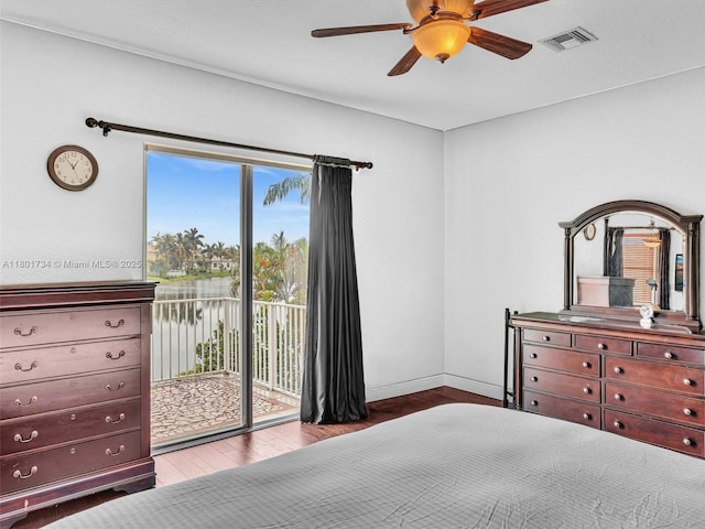 4960 SW 158th Ave, Miramar, FL 33027 - bedroom with access to outside, wood finished floors, a water view, and a ceiling fan