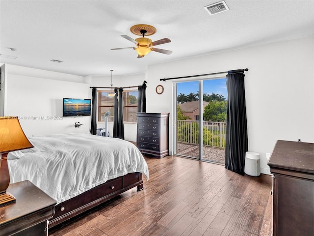 4960 SW 158th Ave, Miramar, FL 33027 - bedroom featuring access to exterior, wood finished floors, and a ceiling fan