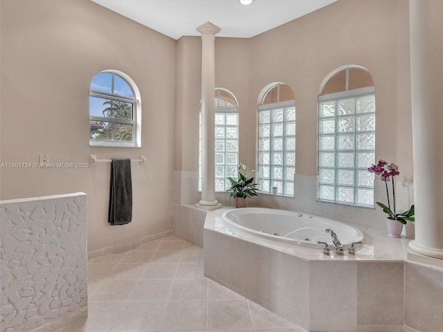 4960 SW 158th Ave, Miramar, FL 33027 - full bathroom featuring decorative columns, a jetted tub, and tile patterned floors