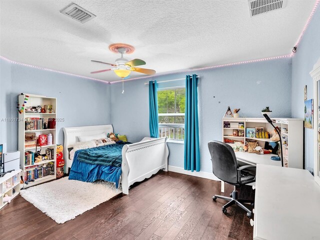 4960 SW 158th Ave, Miramar, FL 33027 - bedroom featuring wood-type flooring, a textured ceiling, an office area, and ceiling fan