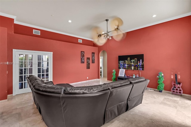 18951 SW 30th St, Miramar, FL 33029 - living room featuring crown molding, arched walkways, baseboards, recessed lighting, and a chandelier