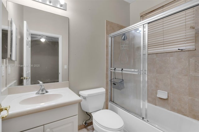 18951 SW 30th St, Miramar, FL 33029 - full bathroom featuring vanity, bath / shower combo with glass door, and toilet