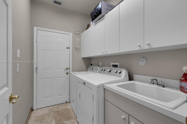 18951 SW 30th St, Miramar, FL 33029 - washroom with cabinet space, separate washer and dryer, and light stone finish floors