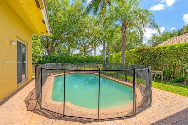18951 SW 30th St, Miramar, FL 33029 - view of swimming pool with a fenced backyard and a patio area
