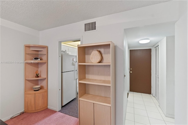 700 SE 6th Ave Unit 314, Deerfield Beach, FL 33441 - hall with a textured ceiling and light colored carpet