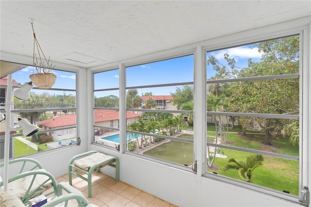 700 SE 6th Ave Unit 314, Deerfield Beach, FL 33441 - sunroom featuring tile patterned floors