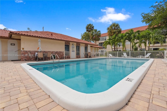 700 SE 6th Ave Unit 314, Deerfield Beach, FL 33441 - community pool with fence and a patio