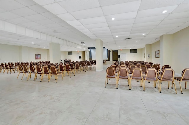 miscellaneous room with light tile patterned flooring, recessed lighting, and a paneled ceiling