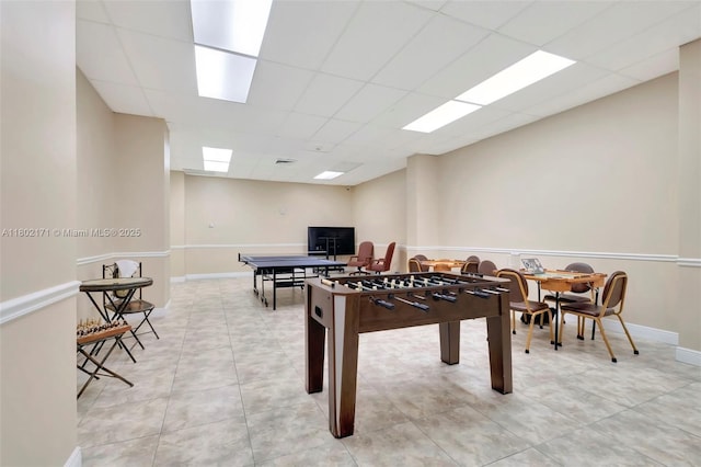 playroom with a drop ceiling