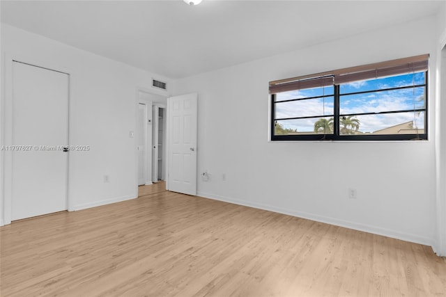4718 SW 67th Ave Unit B6, Miami, FL 33155 - unfurnished bedroom with light wood-type flooring and baseboards