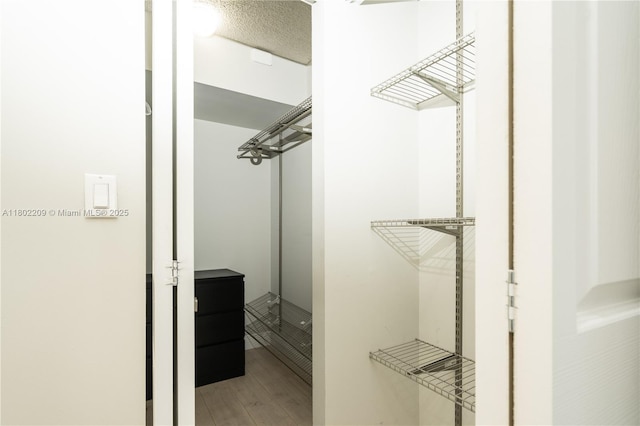 900 Saint Charles Pl Unit 621, Pembroke Pines, FL 33026 - walk in closet with wood finished floors
