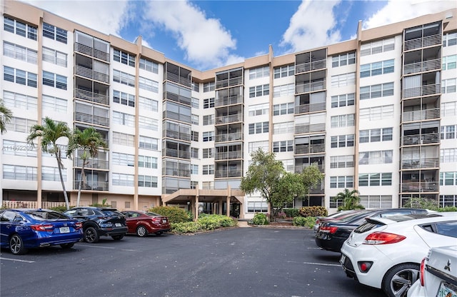 900 Saint Charles Pl Unit 621, Pembroke Pines, FL 33026 - view of apartment building / complex with uncovered parking
