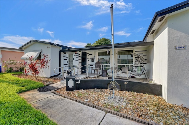 7908 Coral Blvd, Miramar, FL 33023 - view of front facade featuring covered porch and stucco siding