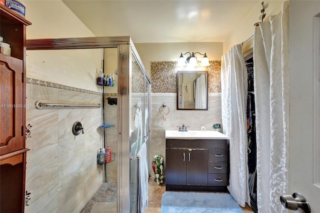 7908 Coral Blvd, Miramar, FL 33023 - bathroom featuring tile walls, a stall shower, and vanity