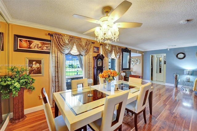 7908 Coral Blvd, Miramar, FL 33023 - dining room featuring a textured ceiling, ceiling fan, crown molding, wood finished floors, and baseboards