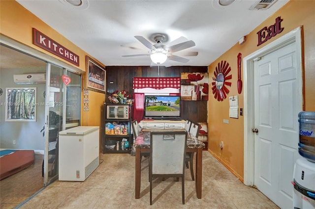 7908 Coral Blvd, Miramar, FL 33023 - dining space with a ceiling fan, light tile patterned floors, and an AC wall unit
