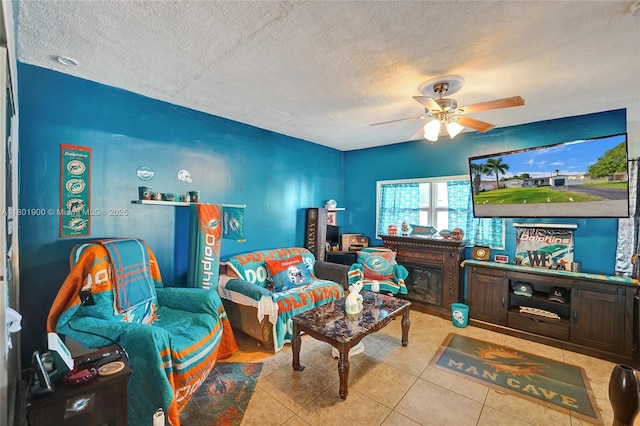 7908 Coral Blvd, Miramar, FL 33023 - living area with a textured ceiling, tile patterned floors, and ceiling fan