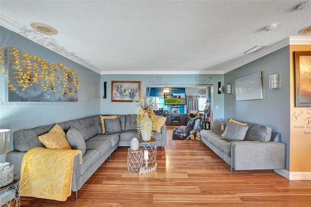 7908 Coral Blvd, Miramar, FL 33023 - living room with a textured ceiling, wood finished floors, ornamental molding, and baseboards