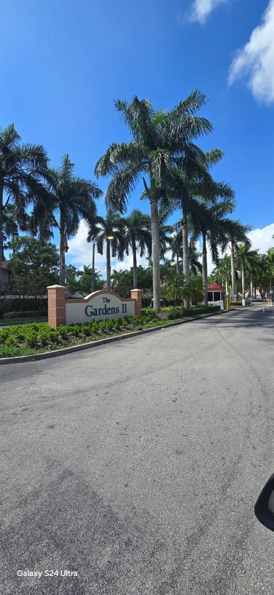 1241 SE 29th St Unit 203-27, Homestead, FL 33035 - view of asphalt road featuring curbs