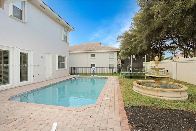 4968 SW 183rd Ave, Miramar, FL 33029 - view of swimming pool featuring fence and a patio area