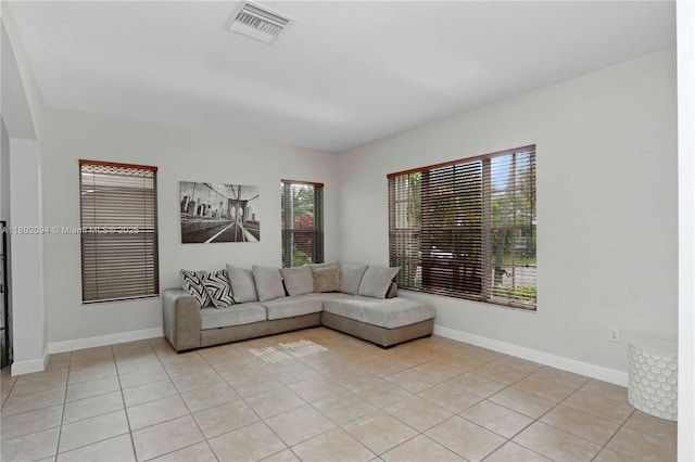 4968 SW 183rd Ave, Miramar, FL 33029 - living room featuring light tile patterned floors and baseboards