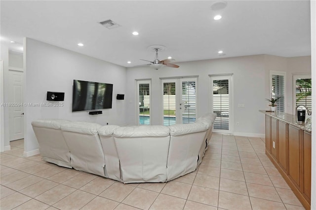 4968 SW 183rd Ave, Miramar, FL 33029 - living area featuring a ceiling fan, light tile patterned floors, plenty of natural light, and recessed lighting