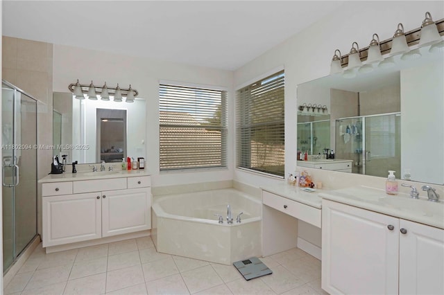 4968 SW 183rd Ave, Miramar, FL 33029 - full bath featuring a stall shower, a garden tub, tile patterned floors, and two vanities