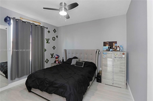 4968 SW 183rd Ave, Miramar, FL 33029 - bedroom featuring baseboards, ceiling fan, and light wood-type flooring
