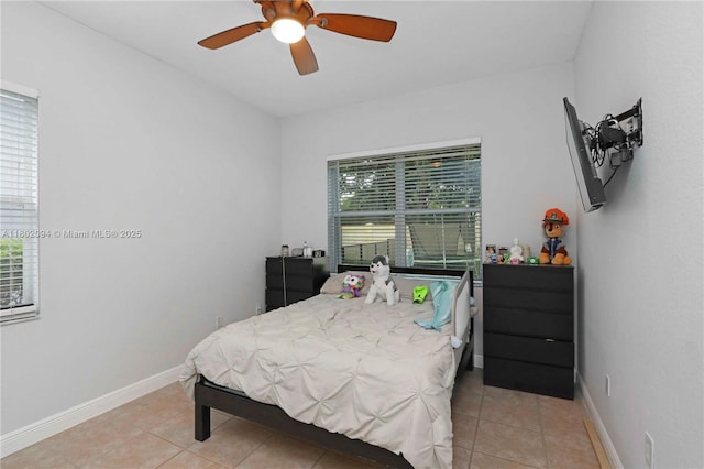4968 SW 183rd Ave, Miramar, FL 33029 - bedroom featuring light tile patterned flooring, baseboards, and ceiling fan