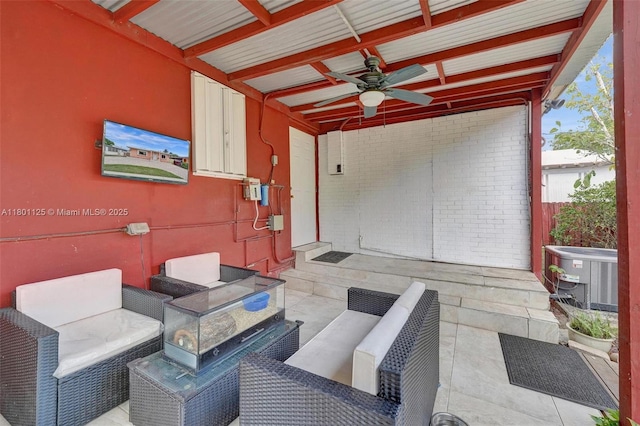 2435 Wilson St, Hollywood, FL 33020 - view of patio with central AC unit, outdoor lounge area, and a ceiling fan