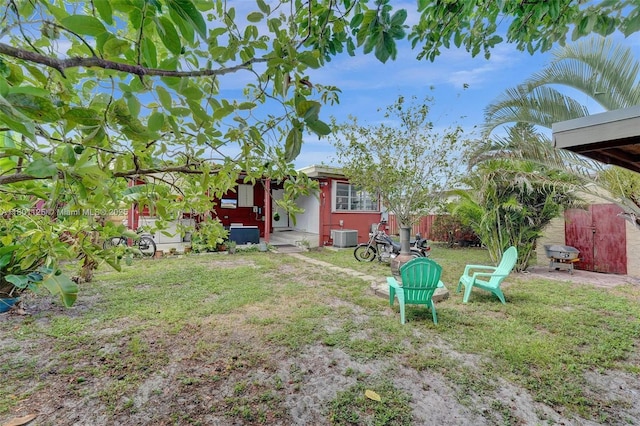 2435 Wilson St, Hollywood, FL 33020 - view of yard featuring central AC