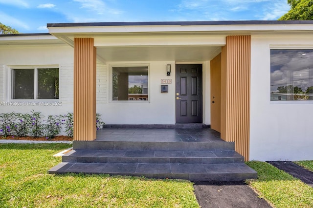 5410 SW 2nd St, Miami, FL 33134 - doorway to property featuring covered porch