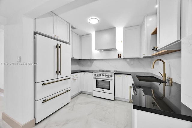 5410 SW 2nd St, Miami, FL 33134 - kitchen featuring freestanding refrigerator, electric stove, a sink, wall chimney range hood, and light marble finish floors