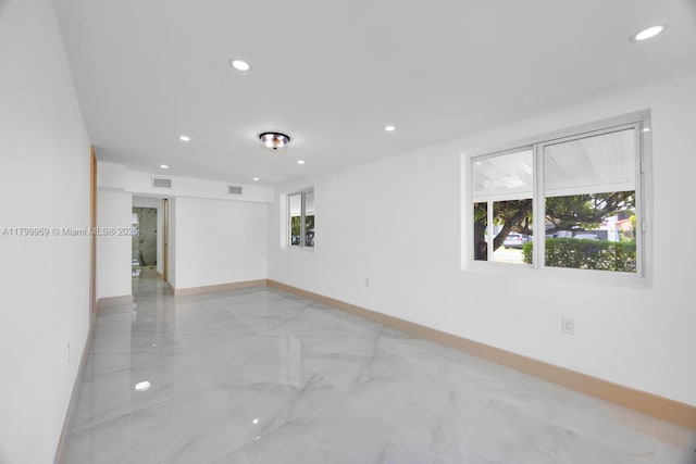 5410 SW 2nd St, Miami, FL 33134 - empty room featuring light marble finish floors, baseboards, and recessed lighting