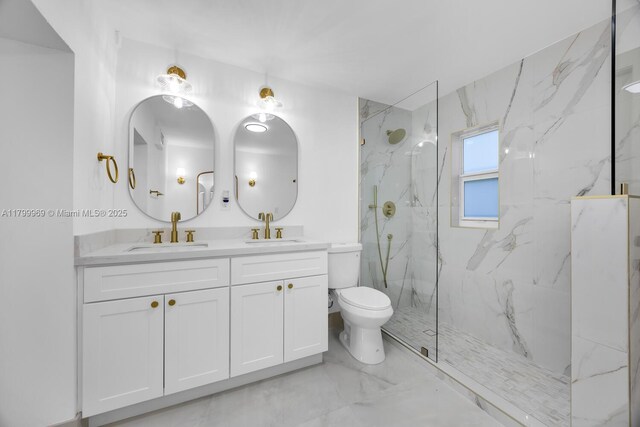 5410 SW 2nd St, Miami, FL 33134 - full bath with marble finish floors, a marble finish shower, toilet, and double vanity