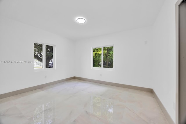 5410 SW 2nd St, Miami, FL 33134 - unfurnished room with baseboards and light marble finish flooring