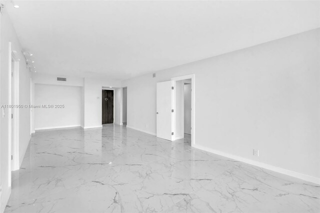 20335 W Country Club Dr Unit 1108, Aventura, FL 33180 - empty room with marble tiled floors, baseboards, and recessed lighting